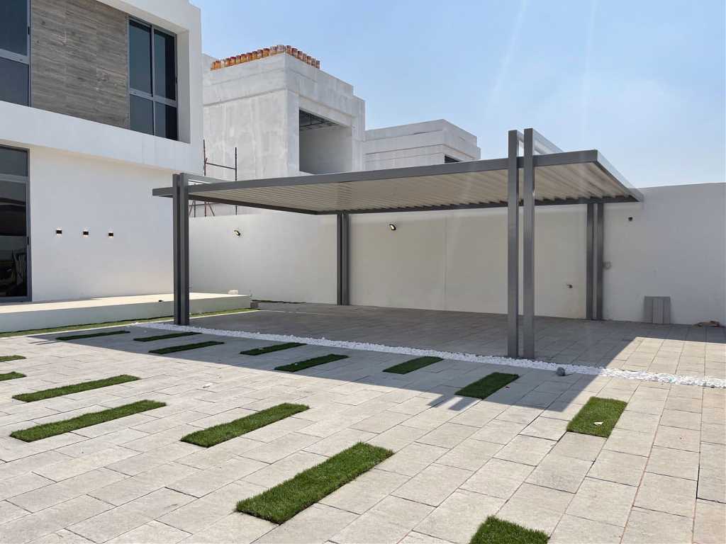 الواحة لأعمال اللحام ومظلات السيارات